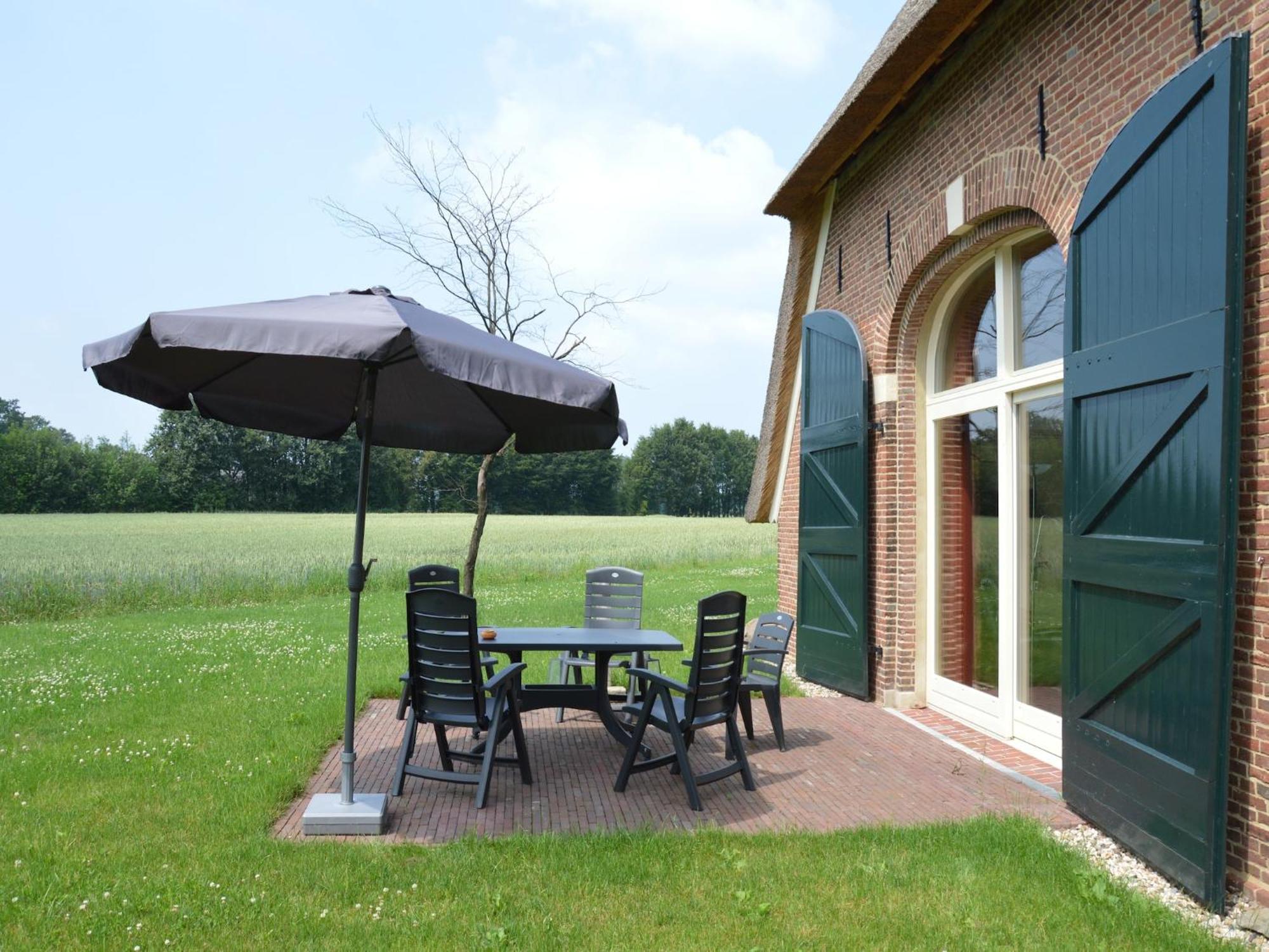 Quaint Farmhouse In Geesteren With Meadow View Exterior photo