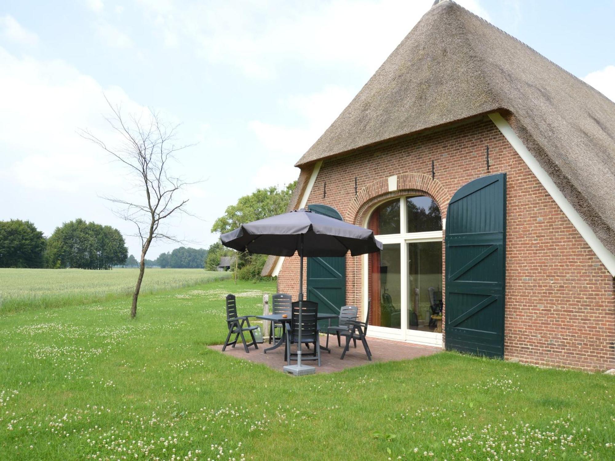 Quaint Farmhouse In Geesteren With Meadow View Exterior photo